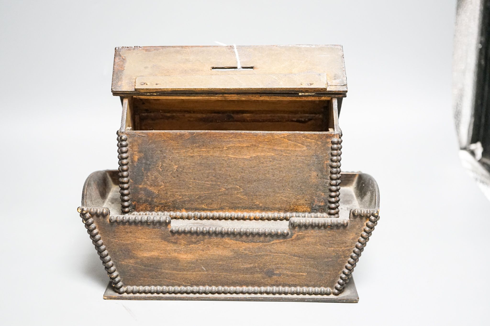 A late 19th century/early 20th century stained plywood Noah’s Ark money box 25cm